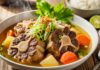 Resep Sop Buntut Sapi yang Gampang, Dijamin Empuk dan Enak! sop buntut sapi kaya rasa dengan sayuran segar dan rempah, menyajikan kelezatan kuliner Indonesia yang menggugah selera.